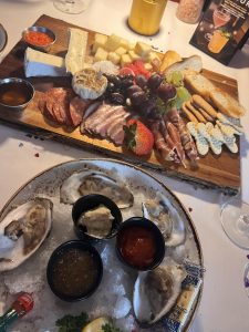 charcuterie board raw oysters at restaurant